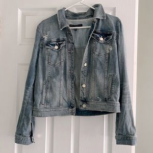 Distressed denim jacket